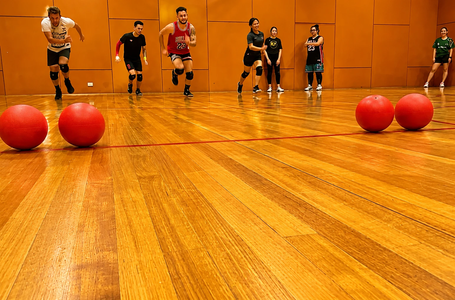 Melbourne Dodgeball players running